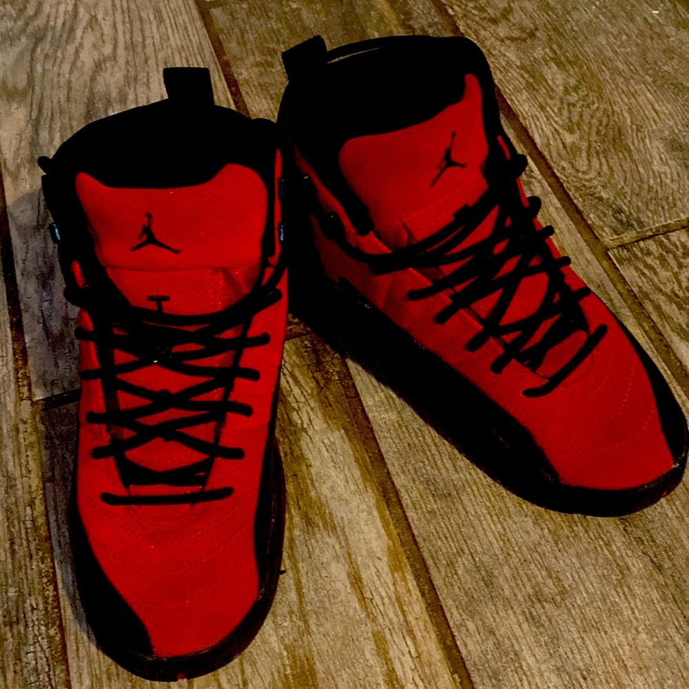 Kids’s size 5 red & black Jordans.
